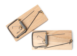 Two spring-loaded bar mousetraps isolated on white, top view