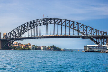 Fototapeta premium The Sydney Harbour Bridge is one of the world’s most recognisable landmarks. Not only is it the largest steel arch bridge on the planet, but it also spans one of the globe’s finest natural harbours.