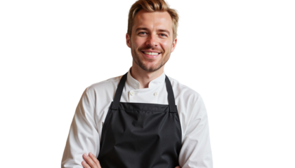 Confident European man smiling in kitchen with apron, cooking joy