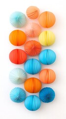 Colorful Accordion Paper Decorations Festive and Playful Design Arrangement on a White Surface Artful Display