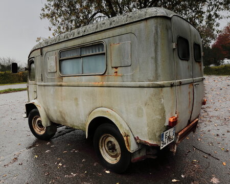 Renault 1000 kg R 2065 Voltigeur van in the rain, old but in driving condition, in a car park on the outskirts of Locronan-Lokorn. Brittany-France-307