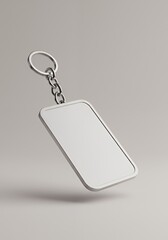 Fototapeta premium Sleek Silver Keychain with Metal Frame Product Mockup for Branding