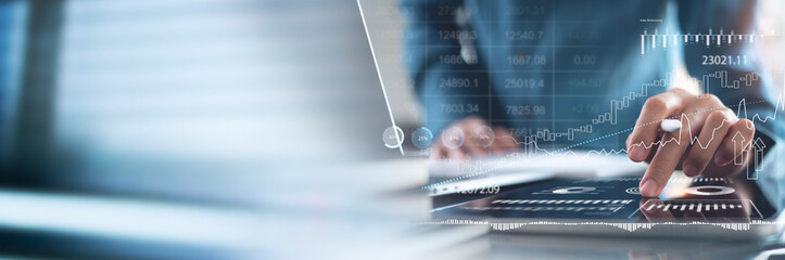 Business data analysis, finance and investment concept. Businessman analyzing market data, financial graph report, economic growth, business strategy, planning and solution, tax and budgeting