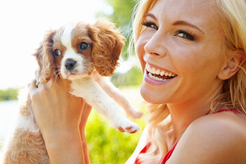 Nature, woman and portrait with dog after adoption, puppy care and bonding together with happiness....