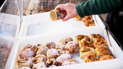 many cinnabons are lying on the counter