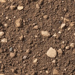 Seamless texture of sandy loam soil, earthy brown with fine grains and occasional pebbles