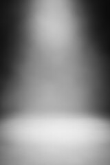 Spotlight on grey gradient background. © rioyoungguns