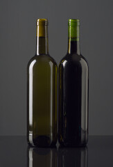 Elegant display of gray wine bottles highlighting distinct colors and unique designs