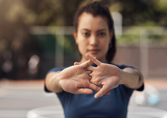 Woman, court or athlete stretching hands for fitness, sports game or preparation for workout. Ready, portrait or female basketball player in morning warm up at park for arms, exercise or training