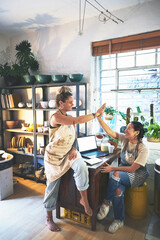 People, high five and celebrate for pottery business, teamwork and artisan trade goals. Ceramic, shop and collaboration with planning for artistic crafts, achievement and support with partnership