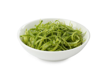 Lime zest in bowl isolated on white