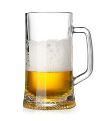 Glass mug of fresh beer with foam isolated on white