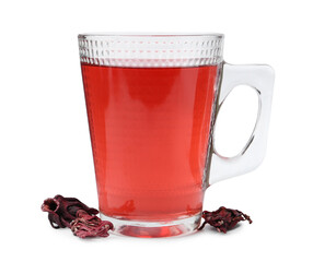 Delicious hibiscus tea in glass cup and dry roselle sepals isolated on white