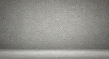 Empty gray wall with minimal design and natural lighting.