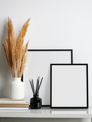 Aesthetic Home Decor with Blank Frames and Dried Pampas Grass