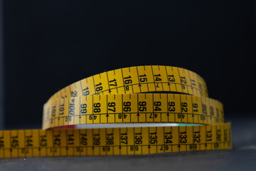 tape measure on a black background