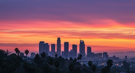 Fototapeta premium cityscape, Los Angeles skyline, vibrant sunset, orange and pink sky, silhouetted skyscrapers, palm trees, urban landscape, dramatic lighting, dusk, panoramic view, downtown LA, twilight, golden hour, 