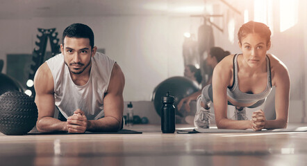 Exercise, plank and portrait of couple on floor of gym together for bonding, training or workout. Balance, fitness or power with man and woman athlete in health club for challenge or performance