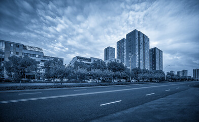 Obraz premium Urban Landscape in Blue Tones Capturing Modern Architecture and City Life