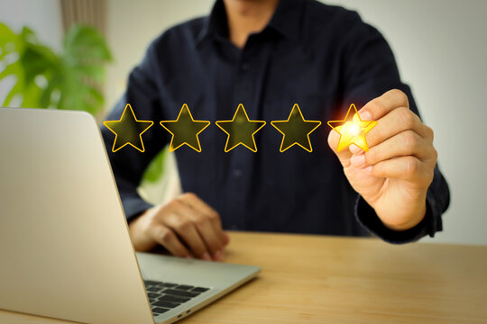 Hand and star checkbox for best quality and customer services rating feedback and satisfaction survey online review questionnaire on technology development for service mind global marketing.