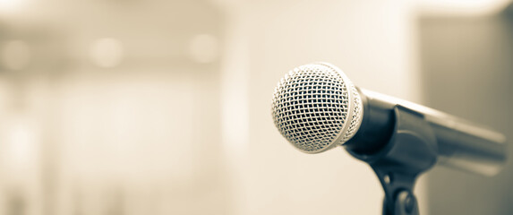 Fototapeta premium Microphone for press conference speaker report interview concepts or broadcasting public speaking speech presentation stage performance and reporter news with empty copy space background.