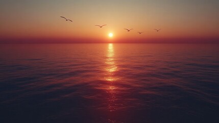 Birds fly over tranquil ocean sunset