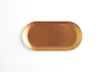 Elegant Oval Brass Tray with Minimalist Design. Copper tray with top view