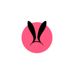two black rabbit ears with pink circles