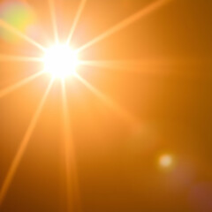 Obraz premium Natural light lens flare on gold background sun ray effect