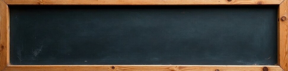 Aged wooden frame surrounds worn black chalkboard Perfect for messages , copy space, learning, vintage