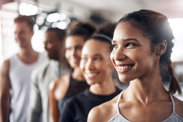 Fitness, thinking and face of woman in gym with friends, exercise and training in sports club. Motivation, athlete team and line of people for wellness, health and workout class with female leader