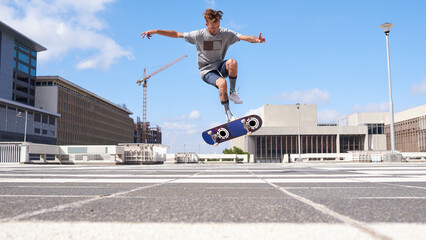 Man, jump or flip stunt with skateboard in city for parkour challenge, extreme sport or cool skill. Male person, hipster or skating with board in air for control, balance or technique in urban town