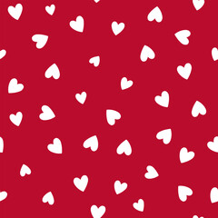 All over seamless vector repeat pattern with ditsy small white hand drawn doodle hearts tossed on red background. Simple cute Valentines day background