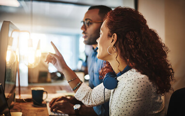 Training, designer or manager on computer for web design, creative website and coaching in startup. Night, people and developer on pc with intern for online project advice, system update and teamwork