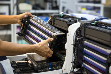 Technician Holding ink printer toner low for replace new or fix repair problem paper or print...