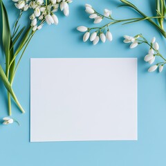 Blank card mockup, snowdrops, blue background, spring