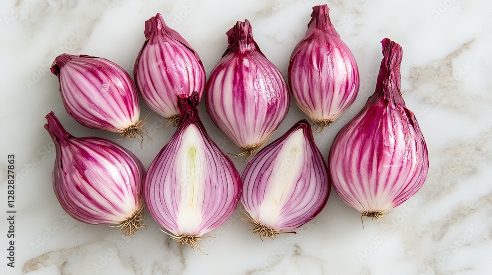 Poster a collection of sliced red onions arranged on a marble surface.
