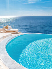 Fototapeta premium Luxury pool overlooking endless ocean horizon on a sunny day