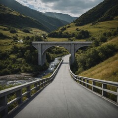 A smooth concrete road running through a valley, with an elegant bridge crossing a river.