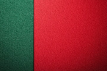 Fototapeta premium Red paper card featuring green felt texture, geometric design perfect for festive greetings or invitations, includes ample blank space for personalized messages and holiday themes