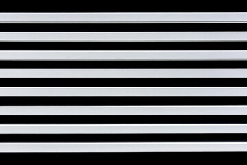 Horizontal white lines create a minimalist pattern on a black background