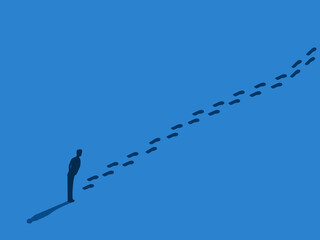 Inspiration ,Follow in footsteps ,Leadership ,Businessman analyzes footprints