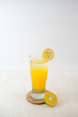 Vibrant Orange Juice With Ice Cubes In A Tall Glass, Garnished With Fresh Orange Slice, Ideal For A Cool, Hydrating, And Fruity Treat.