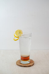 Sparkling Honey Lemon Drink Served In A Tall Glass With Lemon Garnish And Vibrant Layers For A Perfect Thirst-Quenching Beverage Experience.