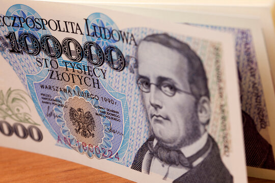 Old Polish money - 100000 Zloty a background.