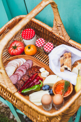 Rustic Picnic Basket with Fresh Produce