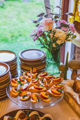 Elegant Appetizers with Floral Arrangement