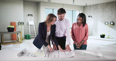 Young Couple Seeking Advice From Realtor