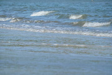 Fototapeta premium The sea water on the beach is a wave of various forms for background.