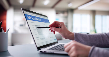 Young Woman Filling out Online Job Application